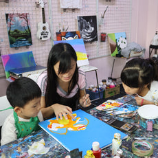 child painting pokemon