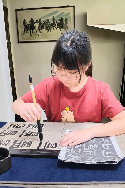 kids learn calligraphy
