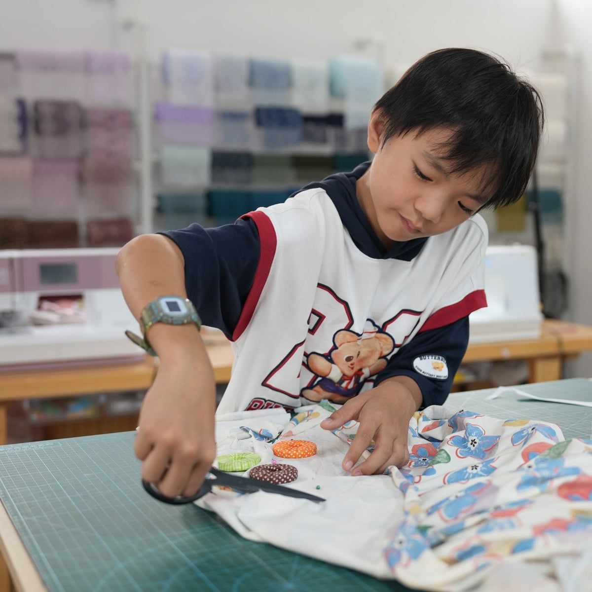 young beginner sewing class